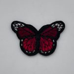 Red Butterfly +$5.00